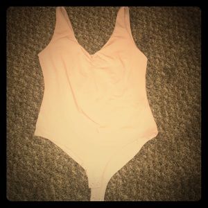 Pale pink bodysuit